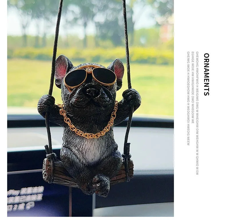 Cartoon-style resin bulldog car pendant hanging ornament in black, white, or yellow.