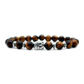 Handmade unisex bracelet with a large 19mm Buddha head bead in Tiger Eye stone.