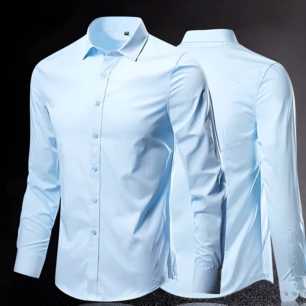 Loose fit long sleeve linen shirt on a hanger, shown in a light colour.