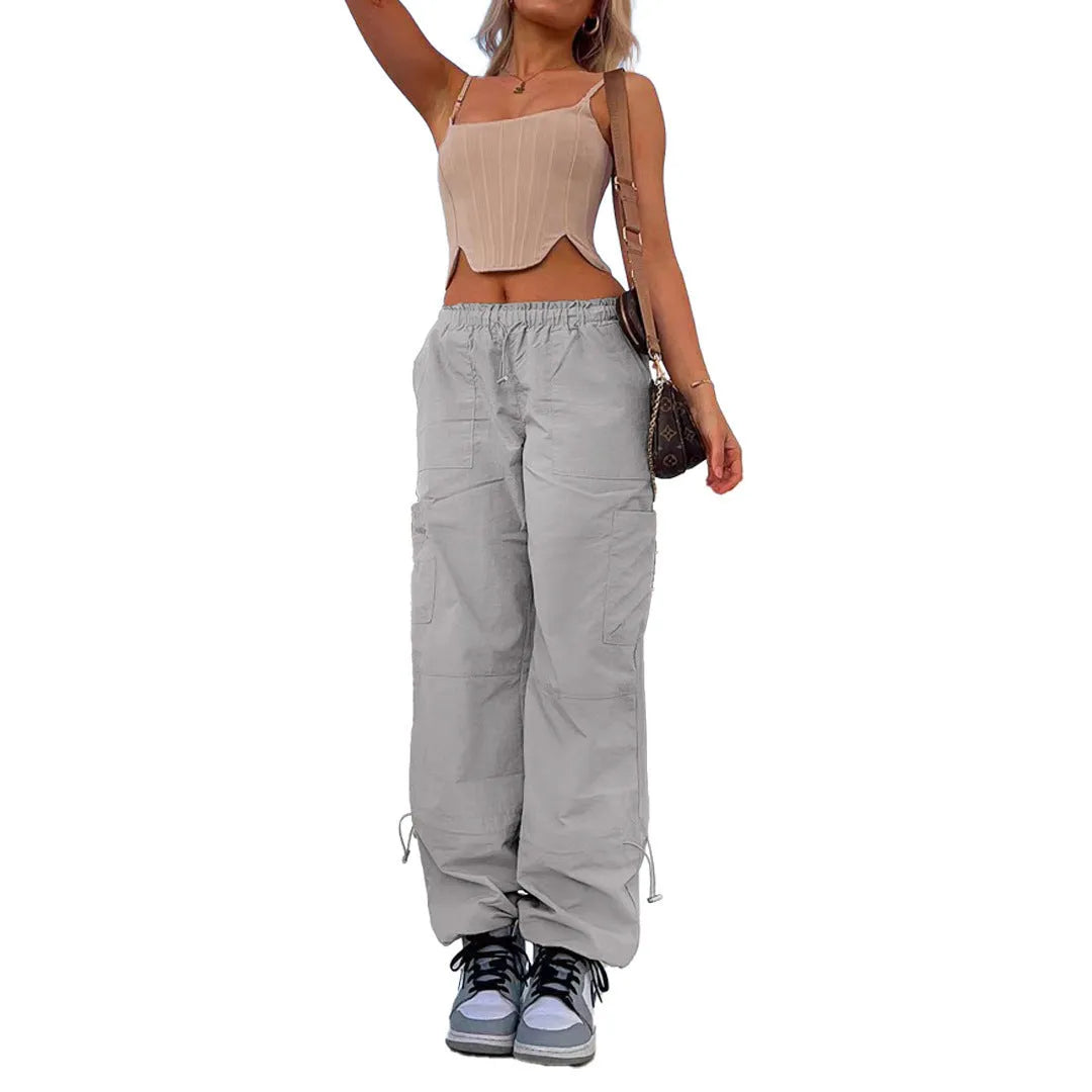 Straight-leg loose fit cargo casual pants in multiple colours on a mannequin, showing utility pockets.
