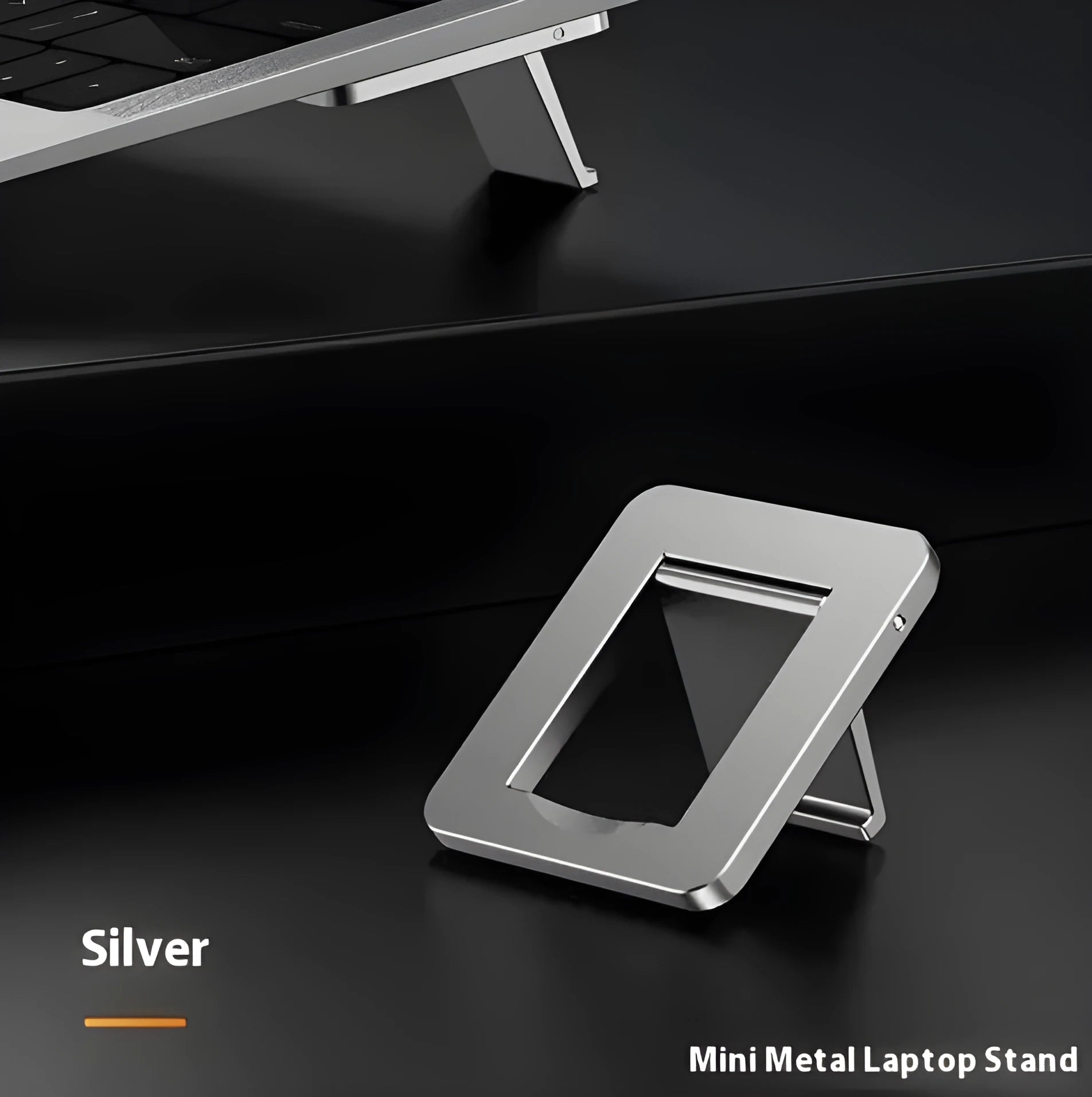 Silver foldable aluminium laptop bracket shown next to 3M adhesive glue on desktop