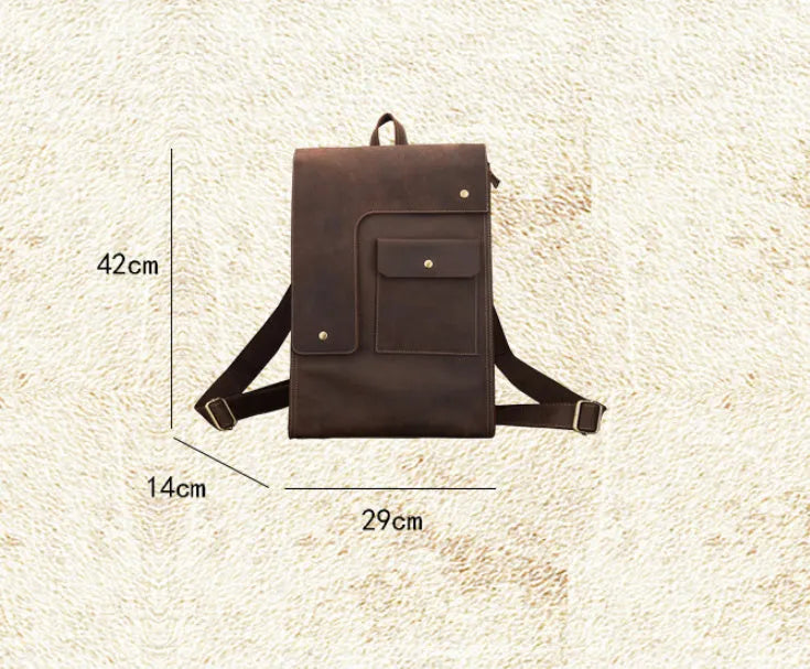 Dark brown genuine leather travel bag with shoulder straps and organised internal compartments