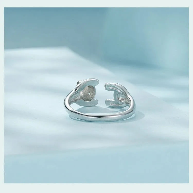 Cute Panda adjustable open ring in sterling silver with white gold plating on a finger.