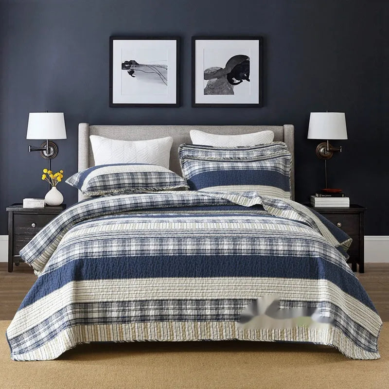 Pure cotton quilt cover set with patterned bedspread and two pillowcases on a bed.