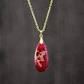 Emperor Stone jade water drop pendant necklace on an 18K gold plated chain, showing heart-shaped and constellation design options.