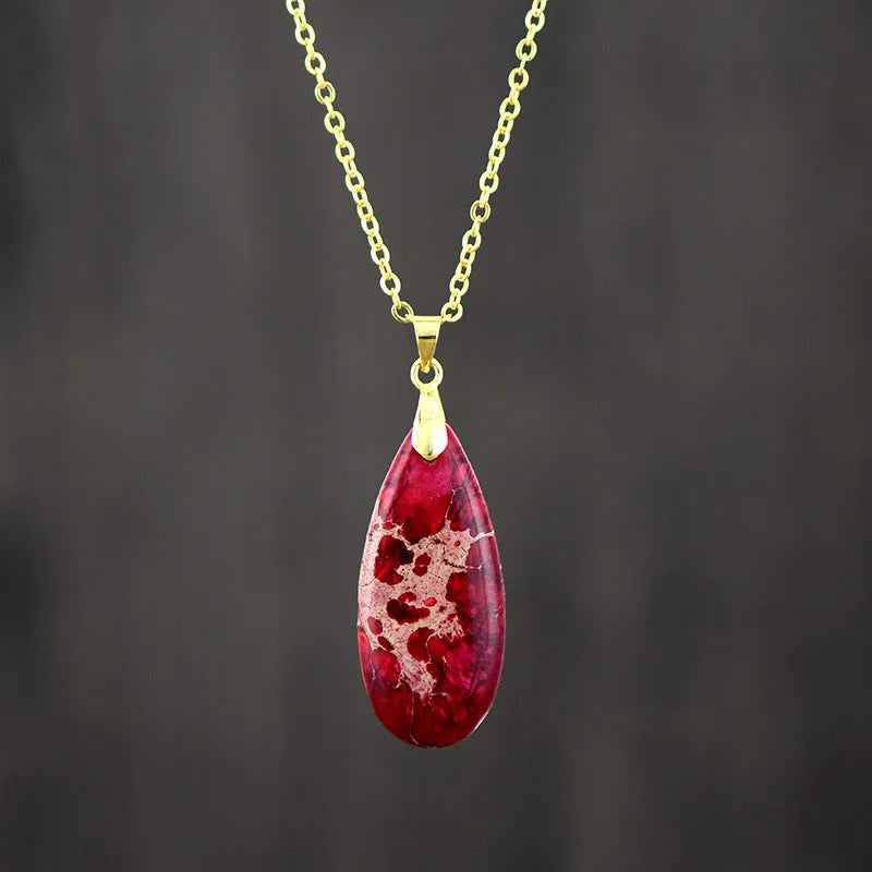 Emperor Stone jade water drop pendant necklace on an 18K gold plated chain, showing heart-shaped and constellation design options.