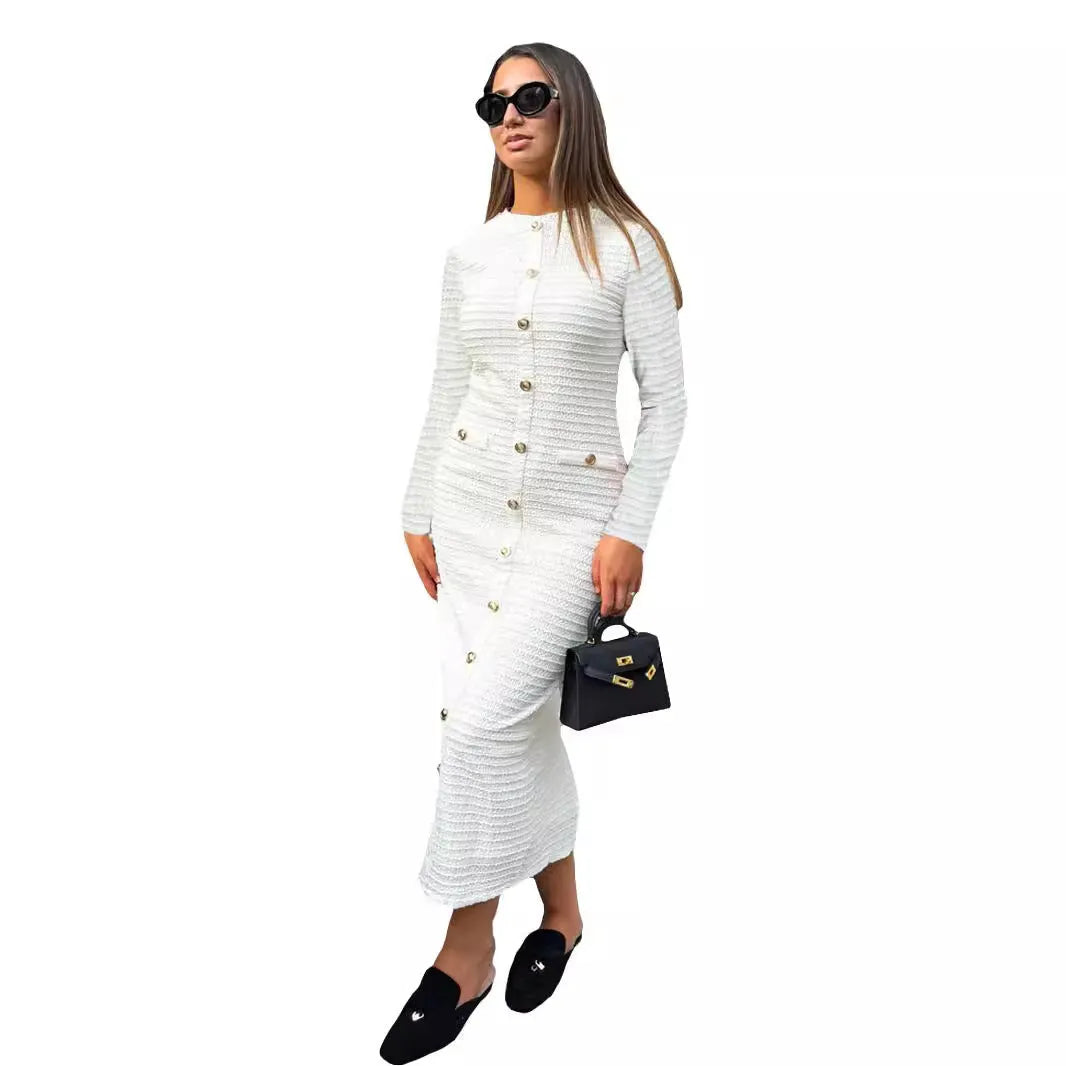 Black slim fit French retro knitted long sleeve dress with button detail on mannequin.