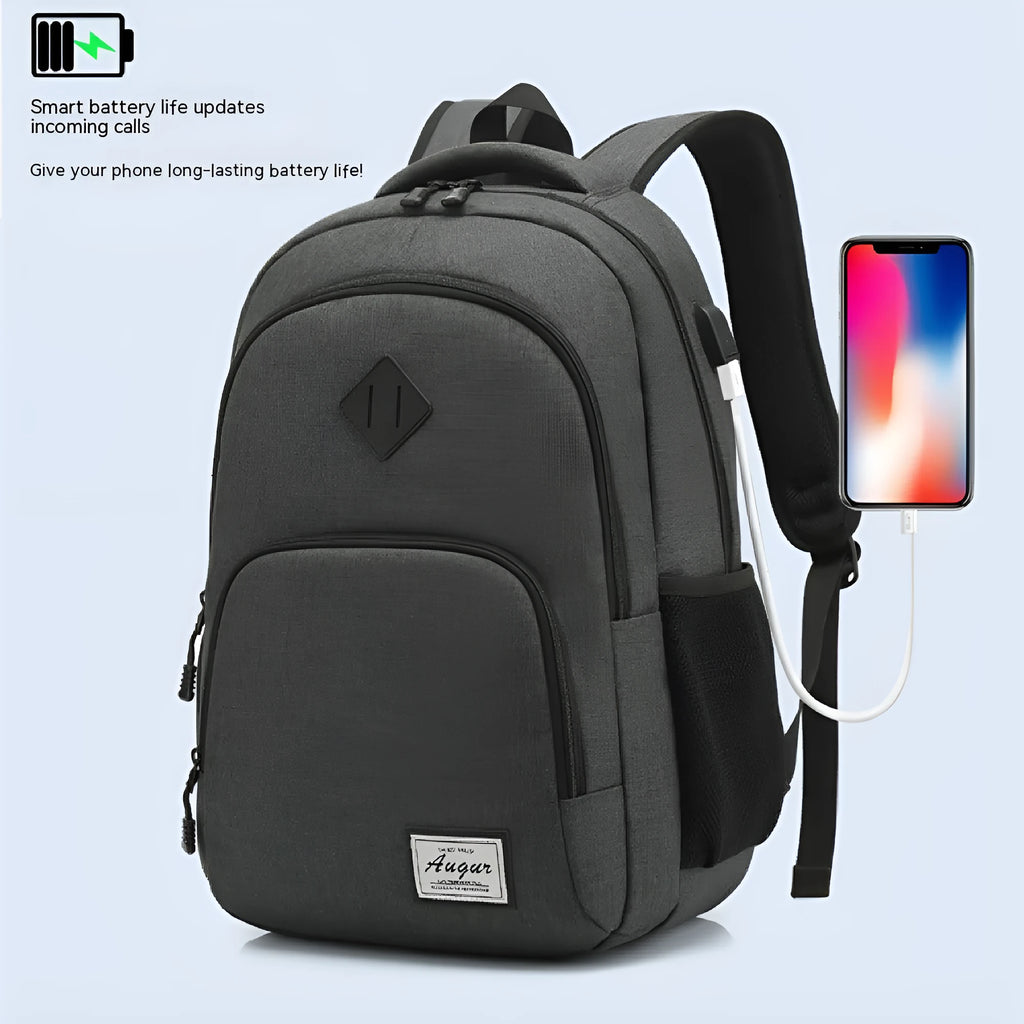 Grey lightweight nylon USB charging backpack with trolley sleeve, shown next to a phone and power bank.