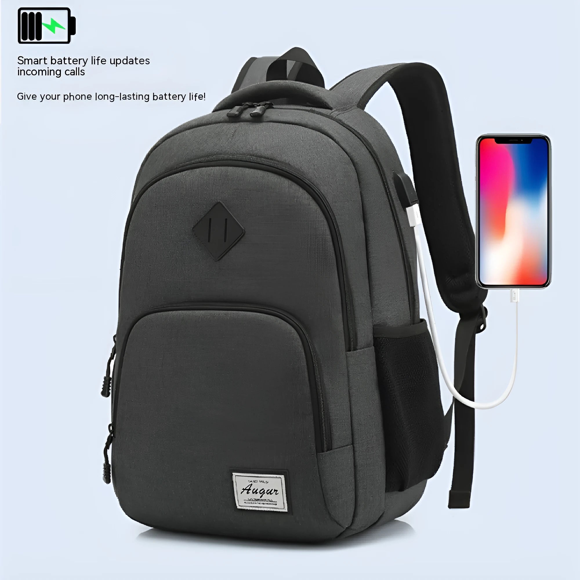 Grey lightweight nylon USB charging backpack with trolley sleeve, shown next to a phone and power bank.