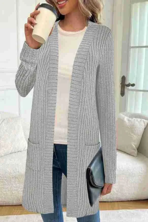 Long sleeve loose cardigan jacket in black, wine red, or grey with pockets, shown on a hanger.