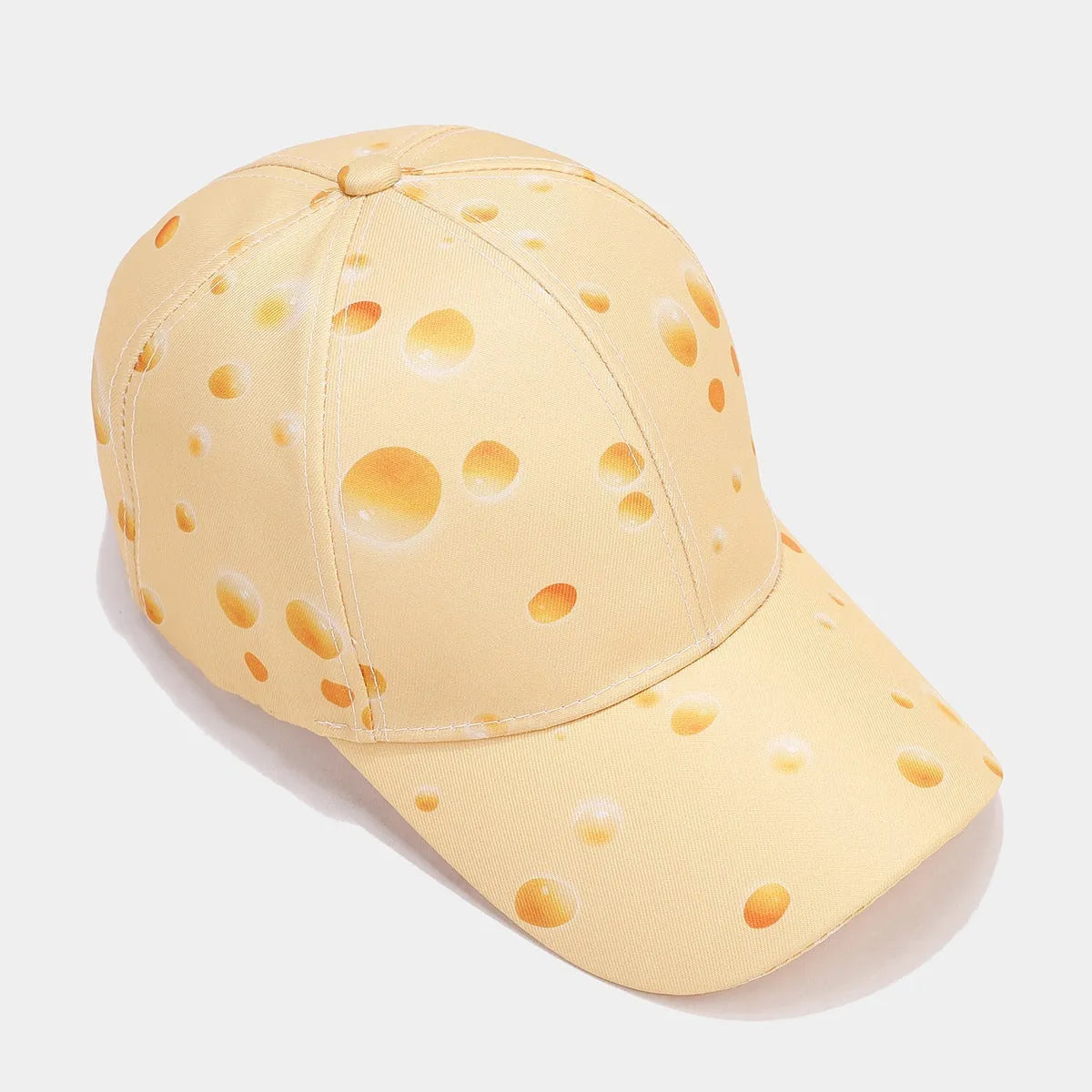 Printed cheese pattern adjustable peaked cap with dome crown and polyester construction