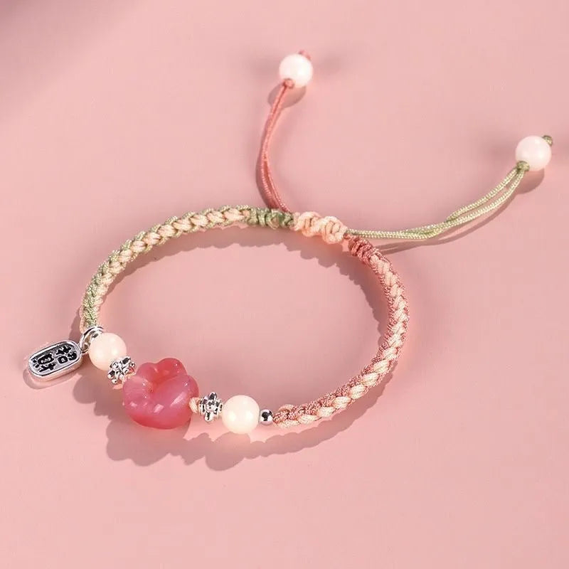Red cat's paw woven bracelet handmade from glass and coloured glaze in pink or yellow couple style