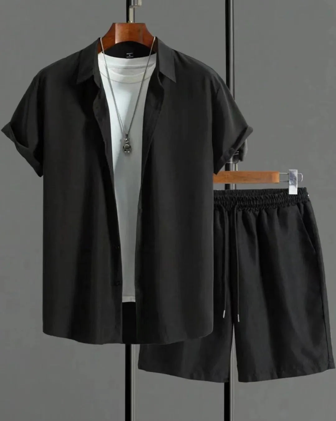 Short sleeve jacquard suit set with shorts in solid colour on a hanger