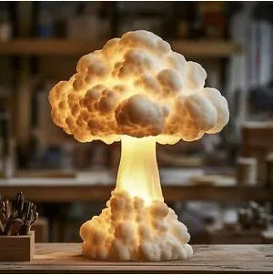 Modern art desk lamp shaped like an atomic bomb mushroom cloud, with a USB power cable.