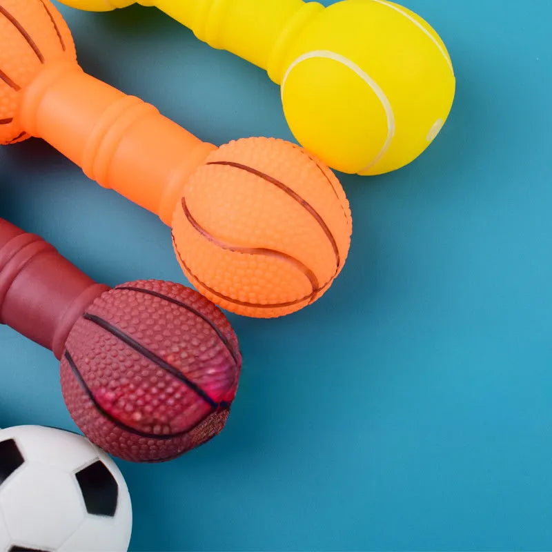 Brown, orange, white, and yellow PVC football and dumbbell shaped squeaky dog chew toys.