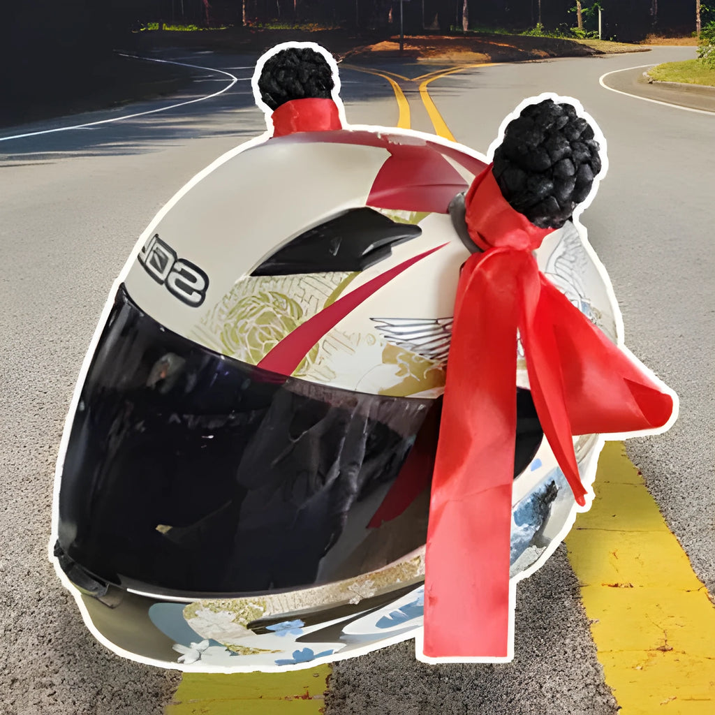 Close-up of black skyhigh braid decorative balls attached to a motorcycle helmet, showing 8cm height