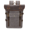 Solid colour canvas computer backpack with USB charging port and curved shoulder straps