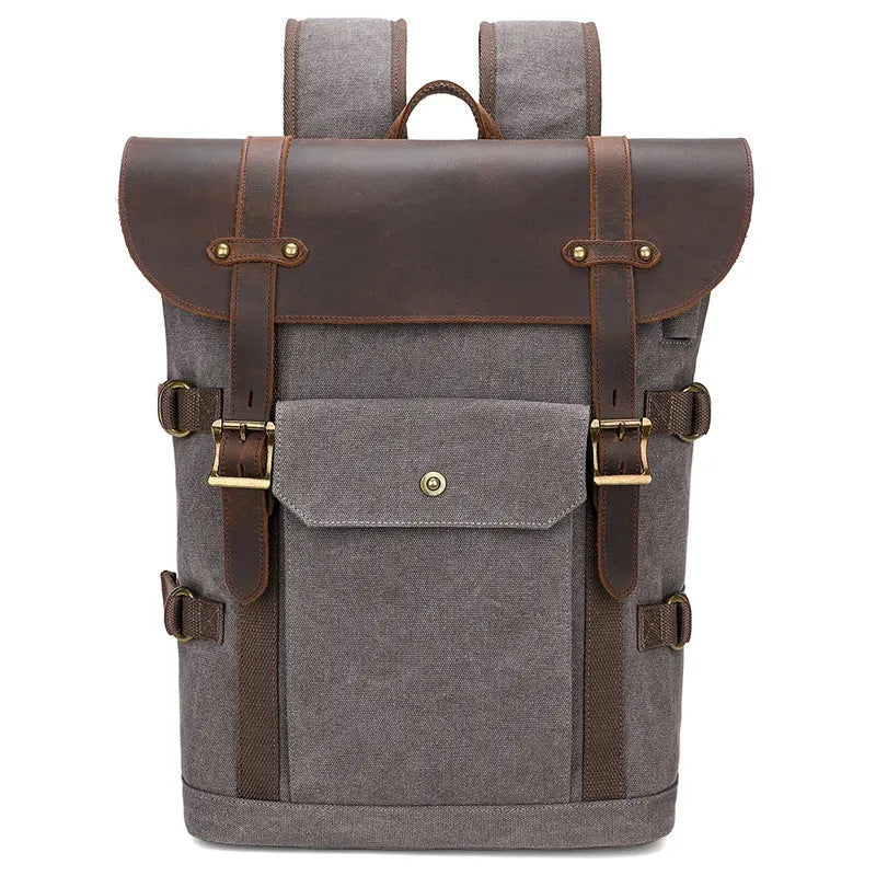 Solid colour canvas computer backpack with USB charging port and curved shoulder straps