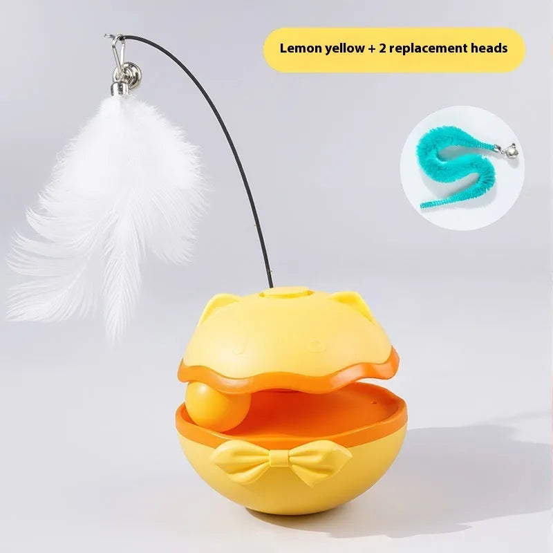 Electric self-righting cat teaser tumbler toy in lemon yellow, sky blue, and soft fog grey on a hardwood floor.
