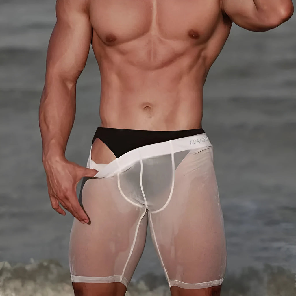 Men's black seamless mesh home shorts made from nylon knit fabric