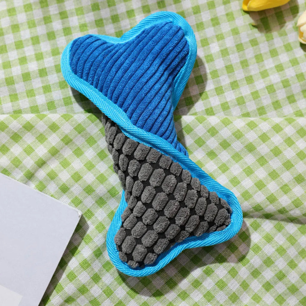Blue teddy dog chew toy with sound bone, showing soft corn fleece lining and bite-resistant fabric.
