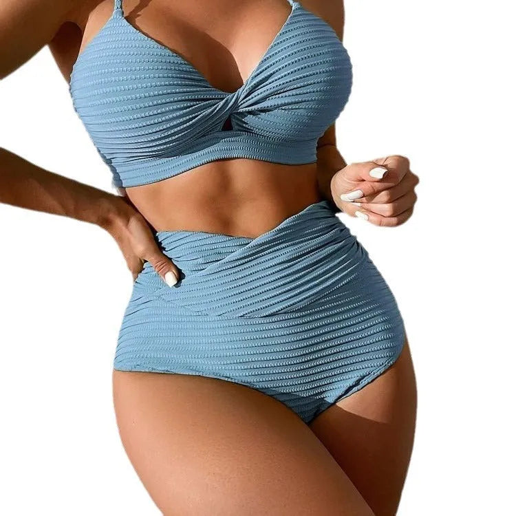 Women's solid colour two-piece bikini swimsuit on a hanger, showing navy blue, orange red, olive green, and blue colour options.
