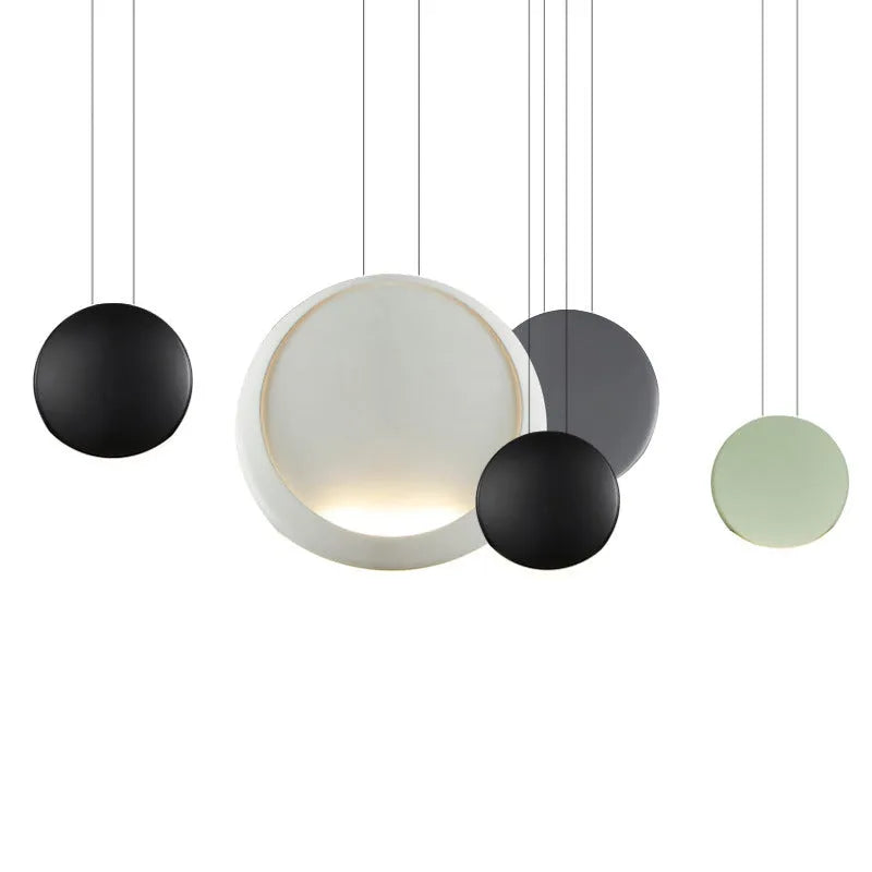 Round crystal-style resin ceiling chandelier with adjustable height, shown illuminated.