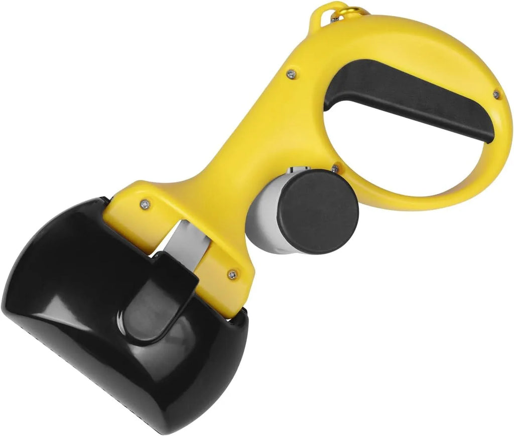 Black pet pooper scooper with built-in trash bag holder made of ABS plastic on a grass lawn.