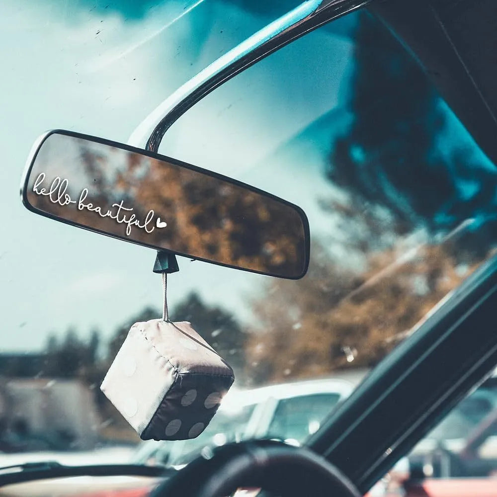Plastic rearview mirror sticker 10x3cm in black on a car mirror