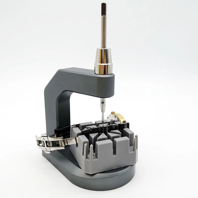 Silver-coloured tool steel press strap removal tool for watches and jewellery with metric blade.