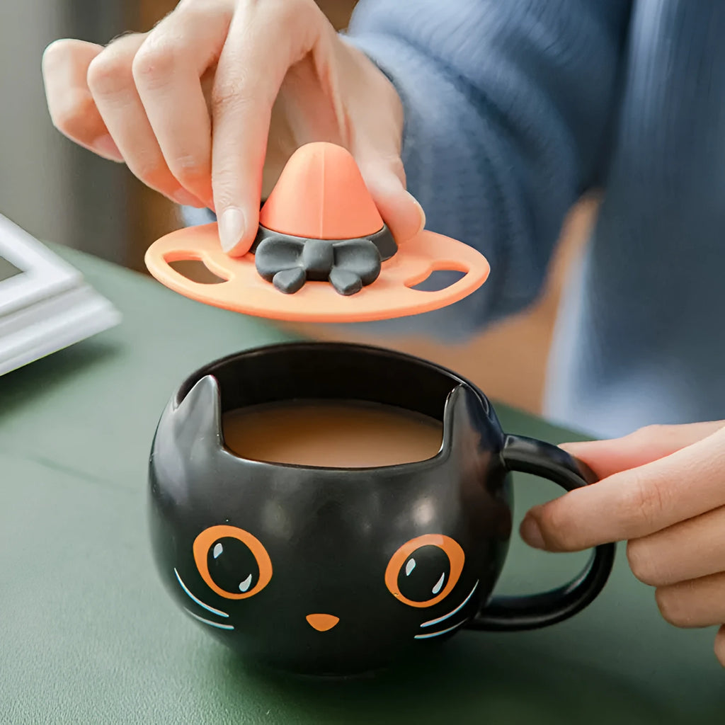 Black cat-shaped ceramic mug with pumpkin decoration and 355ml capacity