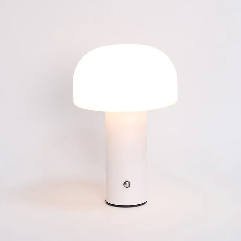 USB-powered decorative atmosphere table lamp in black, green, orange, or white plastic.