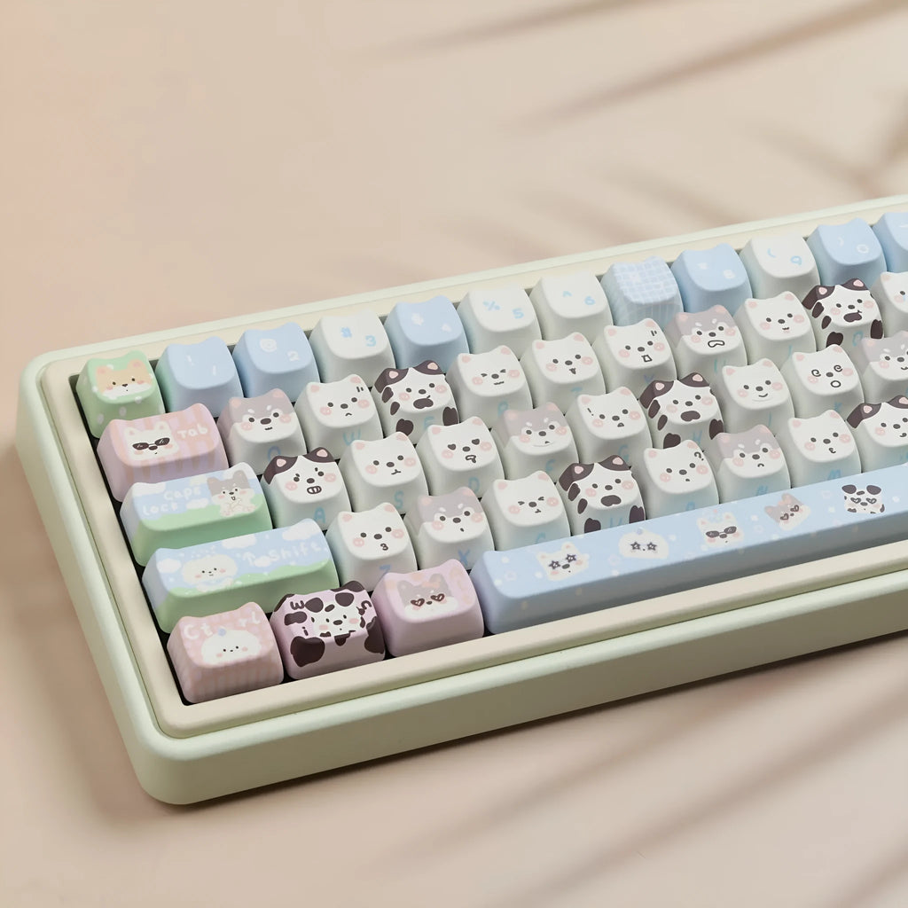 Full set of colourful anime puppy design PBT keycaps for a mechanical keyboard on a white background.