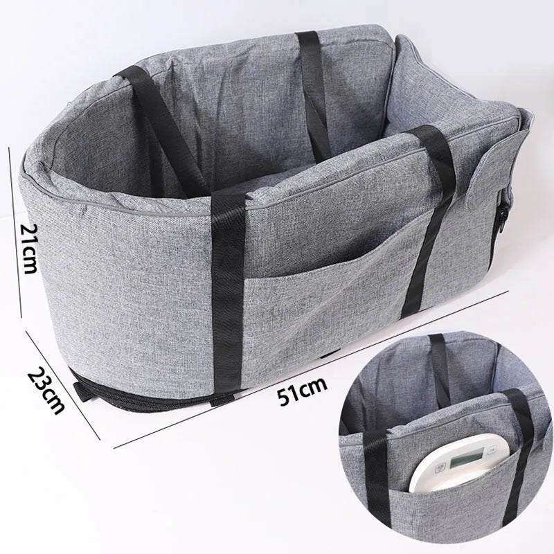 Portable grey cloth dog kennel for outdoor and car travel use.