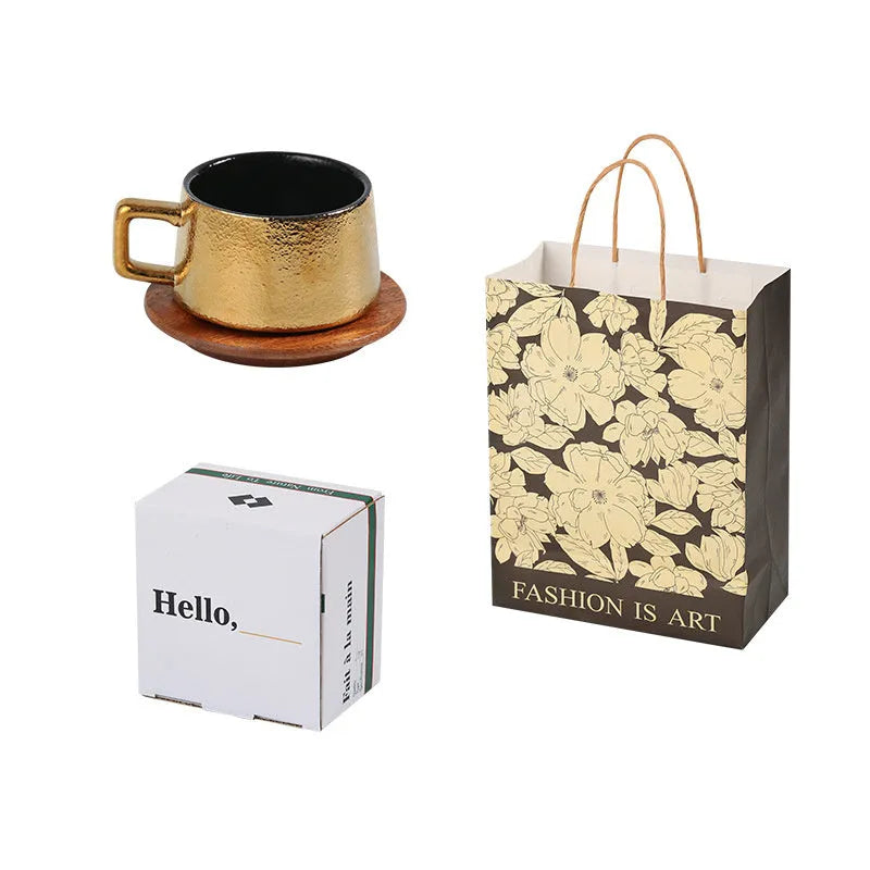 Gold and silver-plated gift boxes containing a solid colour 250ml tumbler cup and optional gift bag.