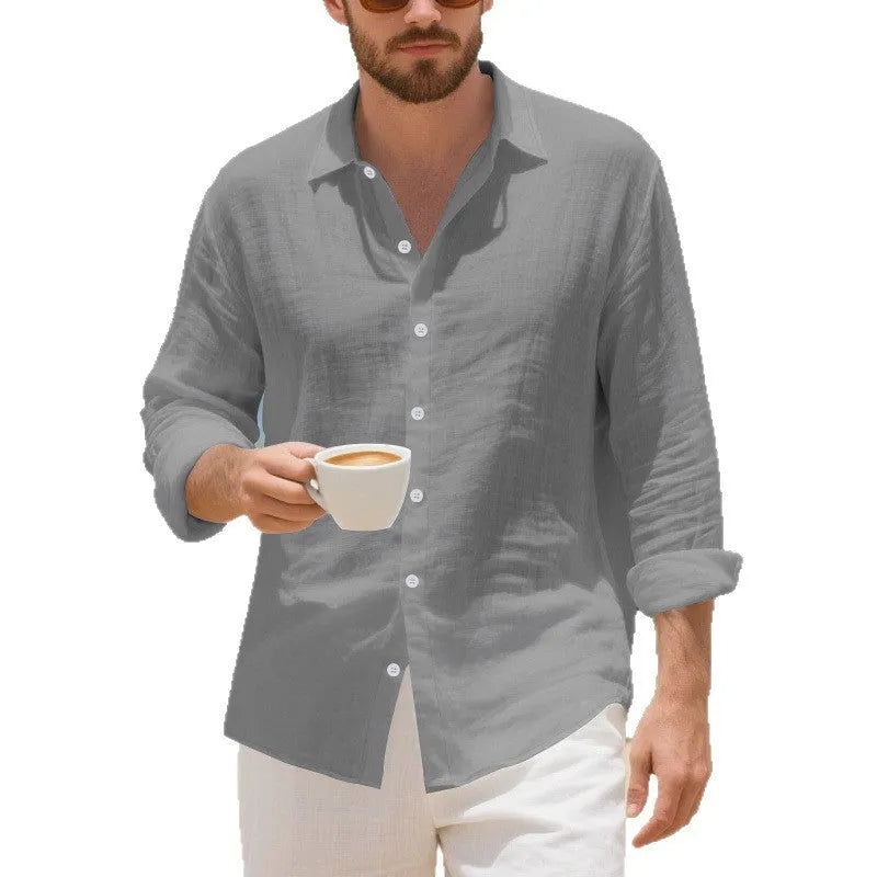 Man wearing a relaxed-fit light blue linen casual shirt with a non-iron finish