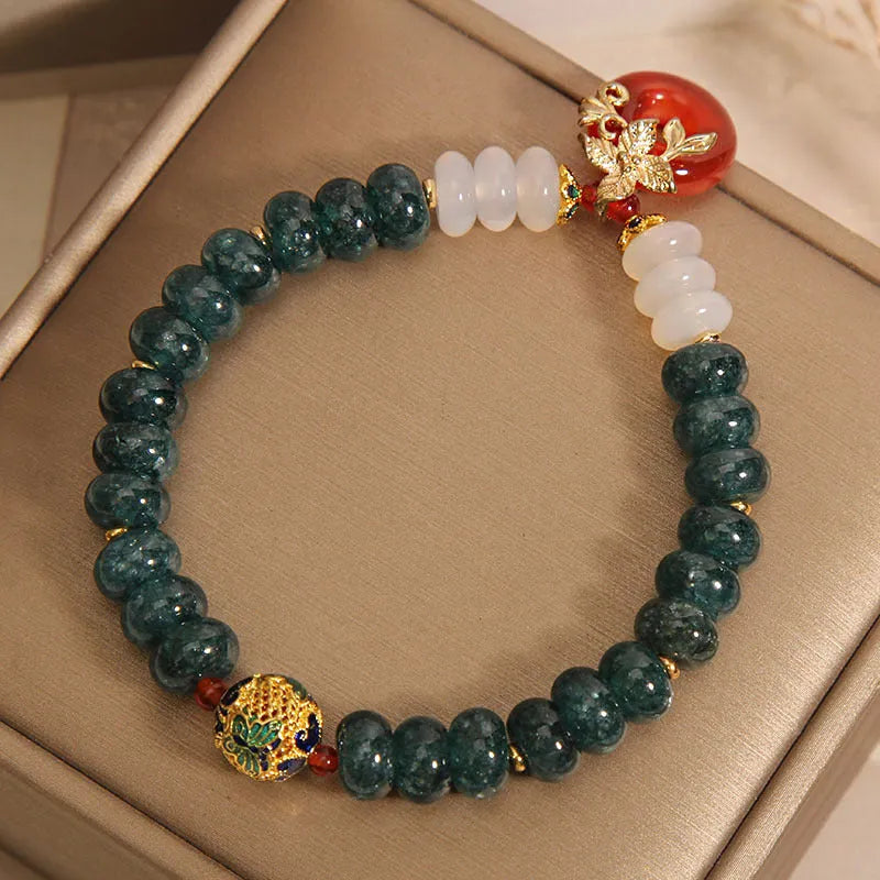 Blue water jade abacus bead bracelet with red agate peace buckle and crystal rhinestone elements