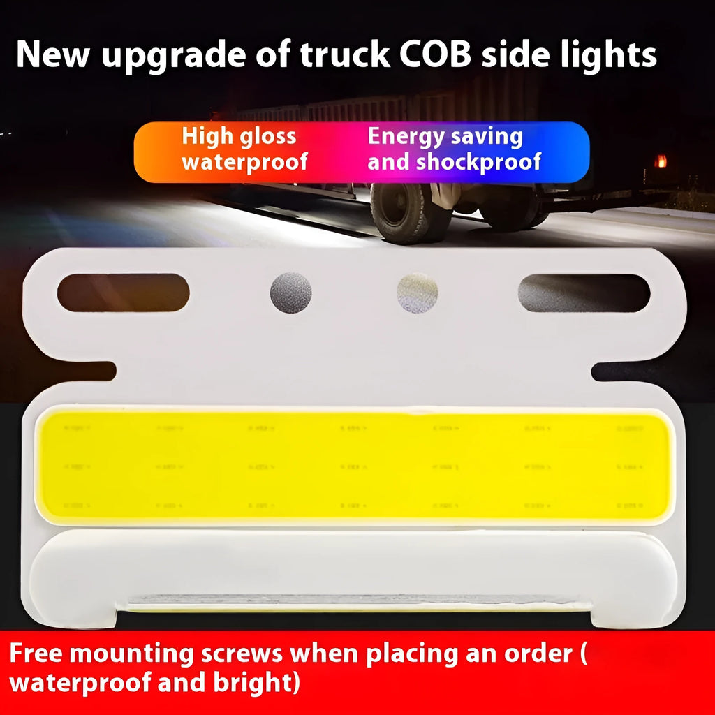 Aluminium alloy COB LED truck side light projecting bright white light onto ground next to tyre.