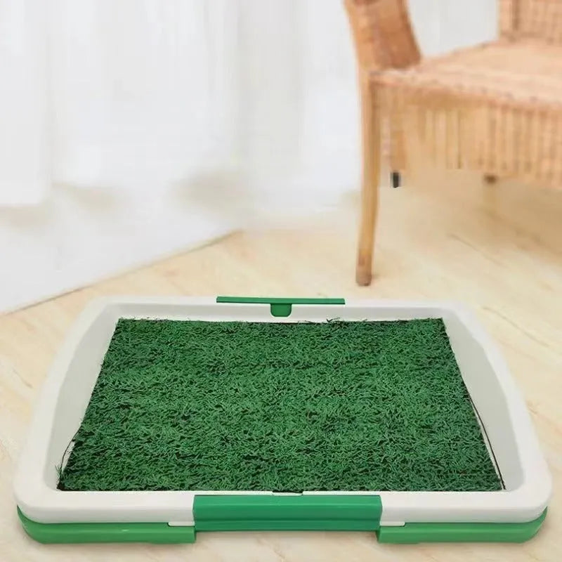 Green synthetic turf dog grass patch toilet training tray with three layers.