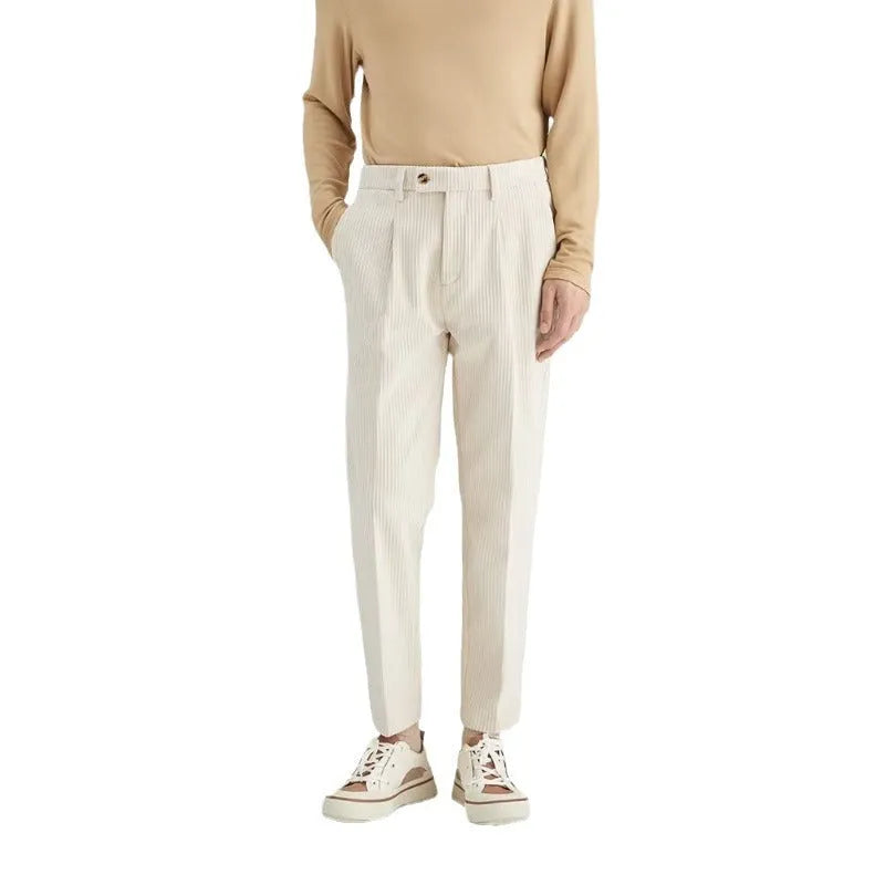 Men's straight-leg corduroy trousers in a loose fit, shown in beige colour.