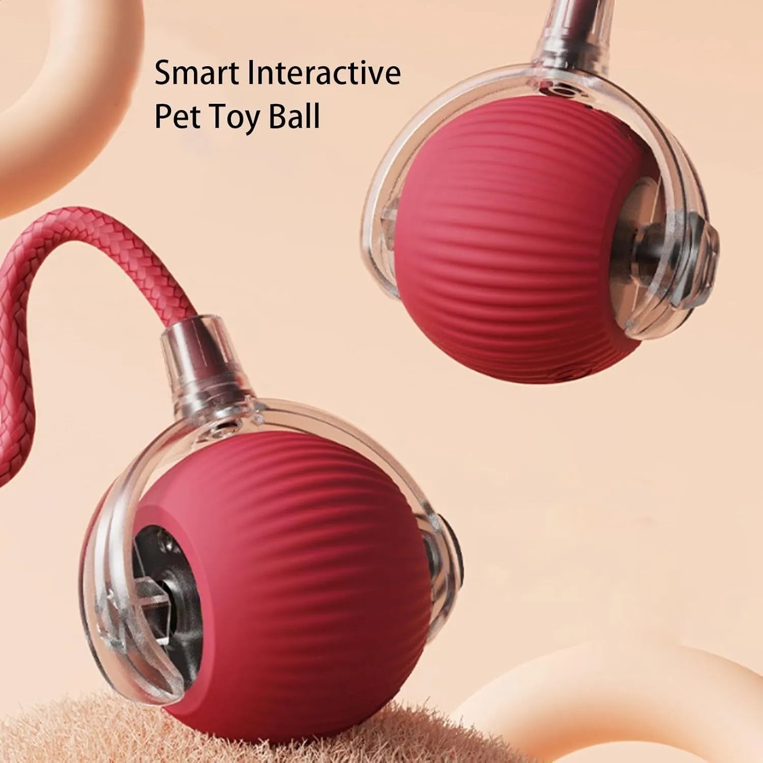 Grey interactive rolling ball pet toy with rope attachment measuring 6.5cm