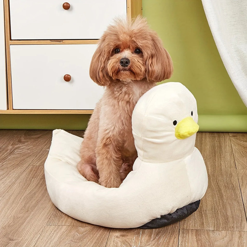 Blue duck-shaped fluffy pet bed sofa for small dogs and cats on wooden floor