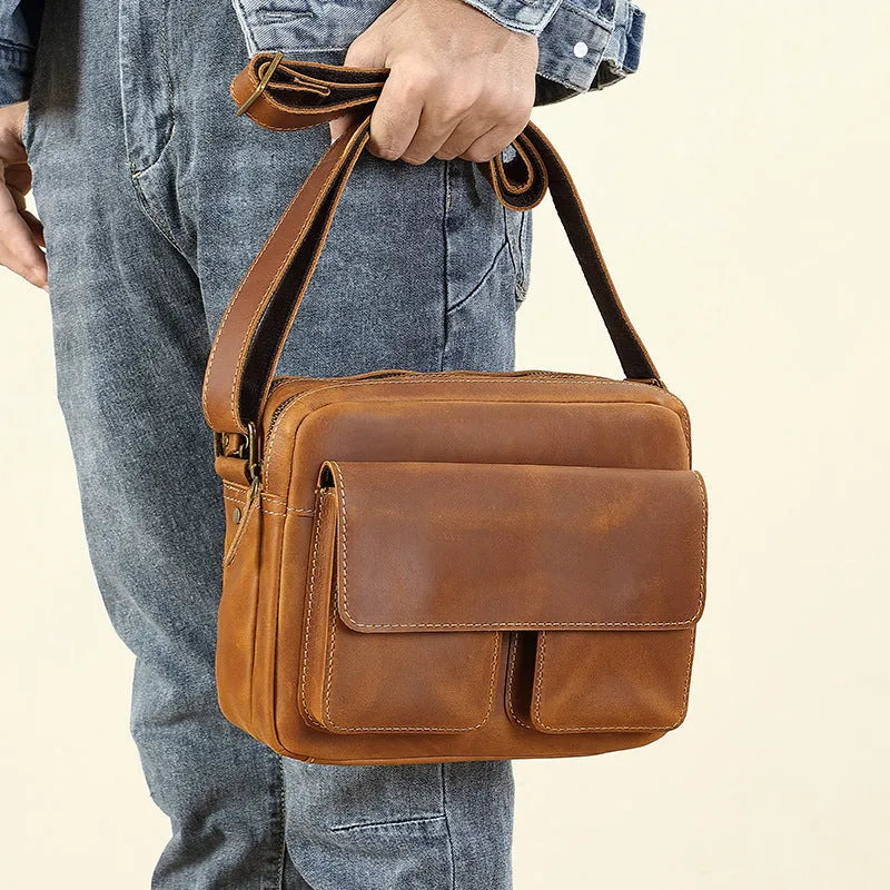 Men's first-layer cowhide leather single-shoulder crossbody bag in Brown 209 with solid colour finish