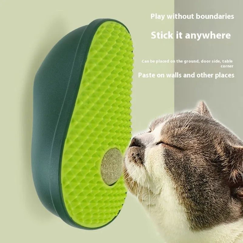 Green avocado-shaped cat scratching toy with sisal scratching surface measuring 13.5cm long