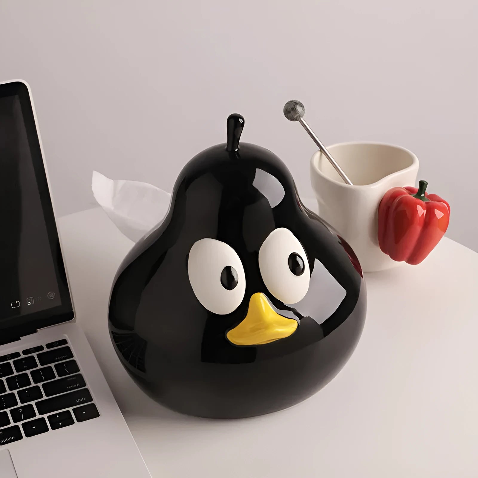 Green ceramic tissue box with cute pear design for living room or desktop.