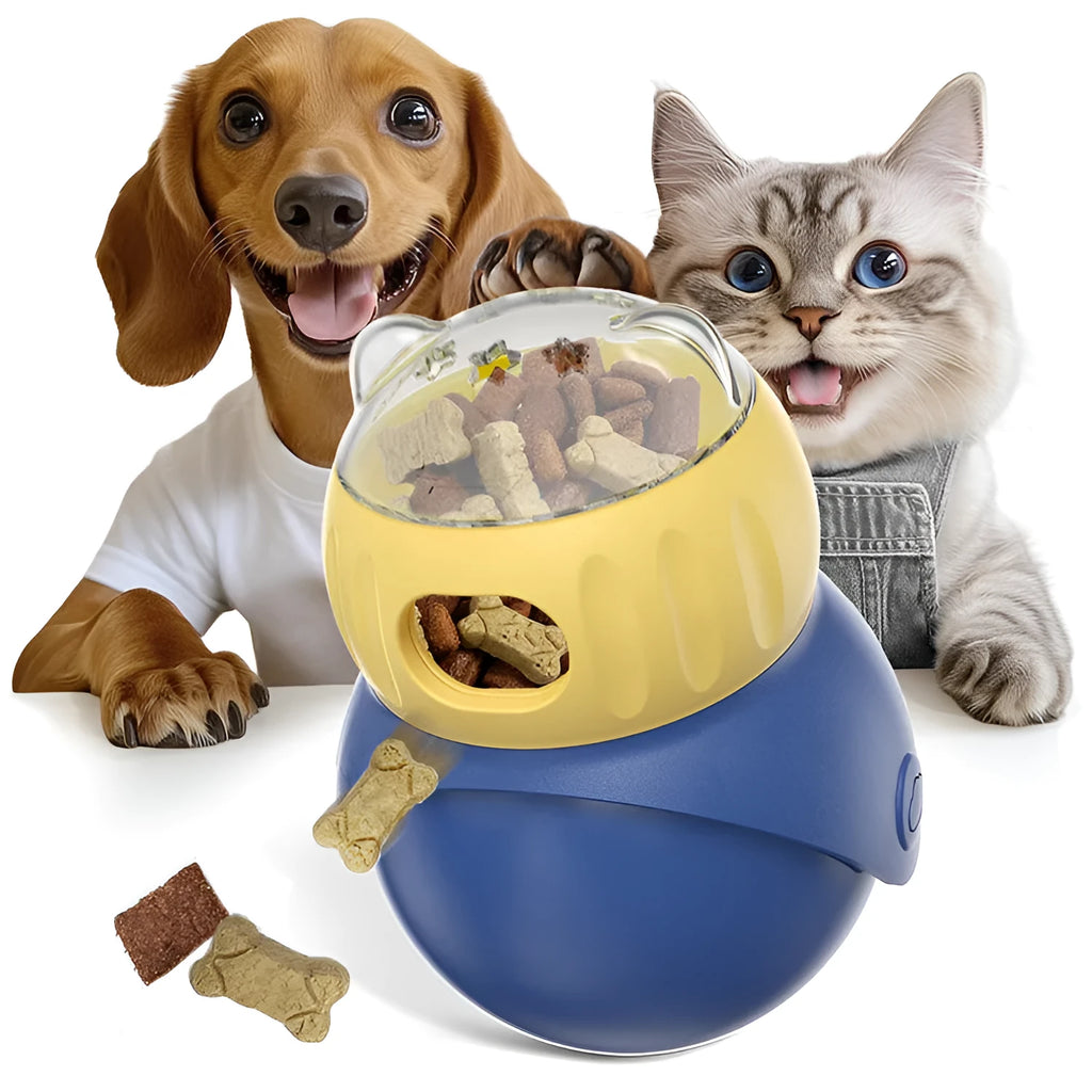 Owl-shaped yellow and blue plastic puzzle feeder for cats on a wooden floor.