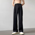 Women's thin straight wide leg trousers in black, showcasing loose fit and non-ironing fabric.