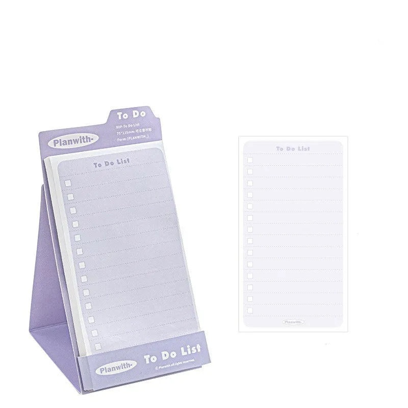 Portable standing Post-it notes in green blank, purple line, blue blank, and gray line colours