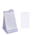 Portable standing Post-it notes in green blank, purple line, blue blank, and gray line colours