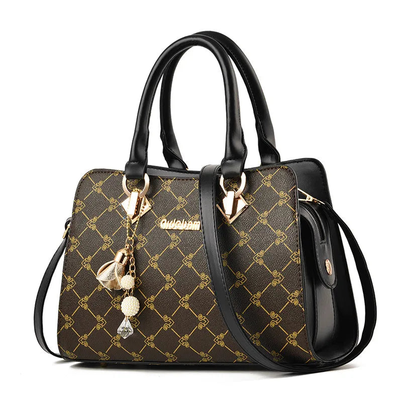 Women's geometric print messenger bag in PU leather with crossbody strap and zipper closure